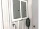 Close up on electrical panel, electrical outlet, and coiled electrical cord at 9615 N County Road 150 E Rd, Pittsboro, IN 46167