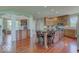 Gourmet kitchen boasts a large island with seating, custom cabinets, and stainless steel appliances at 9615 N County Road 150 E Rd, Pittsboro, IN 46167