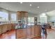 Open-concept kitchen features granite countertops, stainless appliances, and ample cabinet space at 9615 N County Road 150 E Rd, Pittsboro, IN 46167