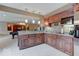 Cherrywood kitchen with stainless appliances, granite countertop, open layout and breakfast bar at 9615 N County Road 150 E Rd, Pittsboro, IN 46167