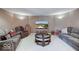 Comfortable living room with a tv, soft carpet, recessed lighting, and plush couches at 9615 N County Road 150 E Rd, Pittsboro, IN 46167