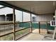 The porch has ample space, ideal for outdoor seating and enjoying the surroundings at 9615 N County Road 150 E Rd, Pittsboro, IN 46167