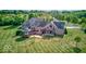 Sprawling home boasts a rear deck with gazebo and spacious yard, perfect for outdoor living and entertaining at 9615 N County Road 150 E Rd, Pittsboro, IN 46167