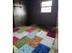 Unique bedroom with wood paneled walls and colorful carpet at 9704 Porter Dr, Avon, IN 46123