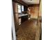 Kitchen featuring stainless steel refrigerator, and retro linoleum flooring at 9704 Porter Dr, Avon, IN 46123