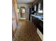 Open concept kitchen featuring laminate countertops and retro linoleum flooring at 9704 Porter Dr, Avon, IN 46123
