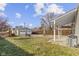 Large backyard featuring a detached garage, a patio, and a spacious yard for outdoor activities at 1019 Lennox St, Anderson, IN 46012