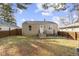 Charming single-story home features a well-manicured front yard and neutral siding at 1019 Lennox St, Anderson, IN 46012