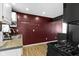 Kitchen featuring stainless steel appliances, granite countertops, and light-colored cabinets at 1019 Lennox St, Anderson, IN 46012