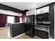 Kitchen with stainless steel appliances, granite countertops, and a functional design at 1019 Lennox St, Anderson, IN 46012