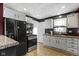 Kitchen boasting stainless steel appliances, white cabinetry, and ample counter space for a modern cooking experience at 1019 Lennox St, Anderson, IN 46012