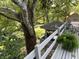 A backyard view showcases a gazebo and lush landscaping at 1020 W Riverview Dr, Anderson, IN 46011