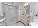 Modern bathroom with a glass-enclosed shower, stylish vanity, and elegant tile work at 1020 W Riverview Dr, Anderson, IN 46011