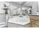 Elegant bathroom featuring a marble jacuzzi tub and ornate decor at 1020 W Riverview Dr, Anderson, IN 46011