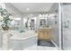 Elegant bathroom featuring a marble jacuzzi tub and ornate decor at 1020 W Riverview Dr, Anderson, IN 46011