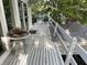 A spacious deck offers an excellent outdoor living space at 1020 W Riverview Dr, Anderson, IN 46011