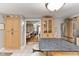 Open concept kitchen with island, wood cabinets, and view to the dining area at 1020 W Riverview Dr, Anderson, IN 46011