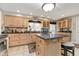 Spacious kitchen with custom cabinetry, granite countertops, and a functional center island at 1020 W Riverview Dr, Anderson, IN 46011