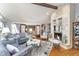 Cozy living room featuring a fireplace and warm lighting, providing a comfortable atmosphere at 1020 W Riverview Dr, Anderson, IN 46011