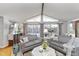 Bright living room with an open floor plan, featuring comfortable seating and ample natural light at 1020 W Riverview Dr, Anderson, IN 46011