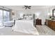 Serene main bedroom with a comfortable chaise lounge and balcony access at 1020 W Riverview Dr, Anderson, IN 46011