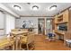 Well-lit office space with hardwood floors, custom cabinetry, and a functional layout at 1020 W Riverview Dr, Anderson, IN 46011