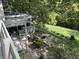 An elevated view of the backyard features a gazebo, greenery and outdoor living spaces at 1020 W Riverview Dr, Anderson, IN 46011