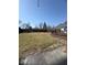 Large backyard with a lawn and a wooden deck at 11215 Cowan Lake Ct, Indianapolis, IN 46235