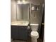 Functional bathroom featuring a vanity, a toilet, and neutral decor at 11215 Cowan Lake Ct, Indianapolis, IN 46235