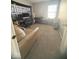 Comfortable bedroom with neutral carpet, a window for natural light, and ample space at 11215 Cowan Lake Ct, Indianapolis, IN 46235