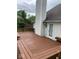 Spacious wooden deck with built-in benches, perfect for outdoor relaxation and entertaining at 11215 Cowan Lake Ct, Indianapolis, IN 46235