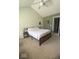 Spacious primary bedroom featuring a ceiling fan, bedside tables, and ample natural light at 11215 Cowan Lake Ct, Indianapolis, IN 46235