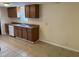 Kitchen featuring neutral countertops and a tile backsplash at 1126 N Mitthoeffer Rd, Indianapolis, IN 46229