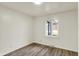 Bedroom with neutral walls, hardwood floors, window, and electrical outlets on the wall at 1157 Evans Ave, Noblesville, IN 46060