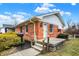 Charming brick home with a well-maintained lawn and inviting front porch at 1157 Evans Ave, Noblesville, IN 46060