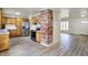 Well-lit kitchen featuring stainless steel appliances and convenient access to the living room at 1157 Evans Ave, Noblesville, IN 46060