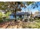 Backyard with patio, grill, and well maintained yard offers an ideal outdoor living experience at 12601 Slippery Rock Rd, Indianapolis, IN 46236