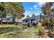Lush backyard with a fire pit provides an inviting outdoor space for entertaining and relaxing at 12601 Slippery Rock Rd, Indianapolis, IN 46236