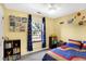 bedroom showcasing a vibrant color scheme, custom storage, and a delightful planetary mobile at 12601 Slippery Rock Rd, Indianapolis, IN 46236