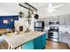 Spacious kitchen with stainless steel appliances, stylish island, and seamless flow into the living area at 12601 Slippery Rock Rd, Indianapolis, IN 46236