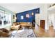 Open living area with comfortable seating, large window and stylish, colorful rug at 12601 Slippery Rock Rd, Indianapolis, IN 46236