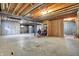 Unfinished basement offers a large open space, wood ceiling, and room for customization at 13788 Four Seasons Way, Carmel, IN 46074