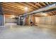 Spacious unfinished basement boasts high ceilings, concrete flooring, and is ready for customization at 13788 Four Seasons Way, Carmel, IN 46074