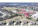 Aerial view of the homes and neighborhood with a school nearby at 14034 Wicklow Ln, Fishers, IN 46040
