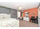 Bedroom featuring dual-tone walls, ceiling fan, window, and decor at 14034 Wicklow Ln, Fishers, IN 46040