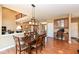 Inviting dining room with modern light fixture, perfect for Gathering meals at 14034 Wicklow Ln, Fishers, IN 46040