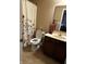 Cozy bathroom featuring a shower with a floral curtain and modern decor at 14309 Shooting Star Dr, Noblesville, IN 46060