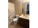 A convenient bathroom features a toilet, vanity with storage, mirror, and neutral tones at 14309 Shooting Star Dr, Noblesville, IN 46060