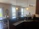 Kitchen with stainless steel appliances, connecting seamlessly to the dining and living areas at 14309 Shooting Star Dr, Noblesville, IN 46060