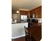 Well-equipped kitchen featuring stainless steel appliances and dark wooden cabinetry at 14309 Shooting Star Dr, Noblesville, IN 46060